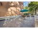 Outdoor patio featuring a dining table, grill, and umbrella for relaxation and outdoor dining at 130 26Th St # 706, Atlanta, GA 30309