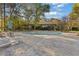 Community pool that is covered with a view of the surrounding trees at 130 26Th St # 706, Atlanta, GA 30309