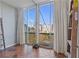Bright sunroom with floor-to-ceiling windows and beautiful views perfect for a home gym at 130 26Th St # 706, Atlanta, GA 30309