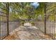 Walking path with a metal fence leading to a walkway at 130 26Th St # 706, Atlanta, GA 30309