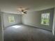 Spacious bedroom with new carpet and bright windows at 20 Emerald Ln, Covington, GA 30014