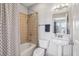 Cozy bathroom features shower-tub combo with patterned shower curtain and pedestal sink at 238 Walker # 39, Atlanta, GA 30313