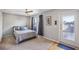 Bright bedroom with exterior access to balcony, neutral carpet and walls at 238 Walker # 39, Atlanta, GA 30313
