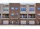 Brick townhouse featuring a garage at 238 Walker # 39, Atlanta, GA 30313