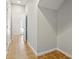 Hallway featuring tile flooring and neutral paint with door leading to other rooms in the home at 238 Walker # 39, Atlanta, GA 30313