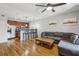 Open concept living room and kitchen with hardwood floors, modern decor, and stainless steel appliances at 238 Walker # 39, Atlanta, GA 30313
