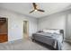 Bedroom with neutral walls, ceiling fan, and a doorway leading to the attached bathroom at 238 Walker # 39, Atlanta, GA 30313