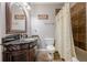 Bathroom featuring vanity with stone countertop, ceramic tile flooring, toilet, and shower at 4891 Tarry Post Ln, Suwanee, GA 30024
