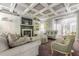 Inviting living room with coffered ceiling, fireplace, and comfortable seating arrangements at 4891 Tarry Post Ln, Suwanee, GA 30024