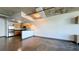 Open floor plan with modern kitchen, stainless steel appliances, and lots of natural light at 115 W Peachtree Nw Pl # 709, Atlanta, GA 30313