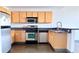 Well-equipped kitchen with stainless appliances, ample cabinetry, and functional layout at 115 W Peachtree Nw Pl # 709, Atlanta, GA 30313