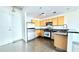 Functional kitchen featuring stainless steel appliances and light wood cabinets at 115 W Peachtree Nw Pl # 709, Atlanta, GA 30313