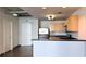 Modern kitchen with stainless steel appliances and a breakfast bar area at 115 W Peachtree Nw Pl # 709, Atlanta, GA 30313