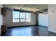 Bright living area with expansive windows offering cityscape views and concrete style at 115 W Peachtree Nw Pl # 709, Atlanta, GA 30313