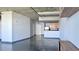 Open-concept living area leading to kitchen, showcasing modern design and spaciousness at 115 W Peachtree Nw Pl # 709, Atlanta, GA 30313
