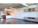 Open floor plan showcases concrete style, with modern cabinets, and access to a stainless kitchen at 115 W Peachtree Nw Pl # 709, Atlanta, GA 30313