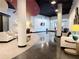 Lobby area featuring seating, architectural columns, and glossy floors at 115 W Peachtree Nw Pl # 709, Atlanta, GA 30313