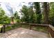 Wooden backyard deck overlooking wooded backyard at 2106 Penrose Dr, Atlanta, GA 30344