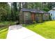Charming house with landscaped front yard and a well-manicured lawn at 2106 Penrose Dr, Atlanta, GA 30344