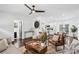 Inviting living room with modern furnishings and an open flow to the kitchen and other living spaces at 2106 Penrose Dr, Atlanta, GA 30344