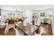 An open-concept home boasts a seamless flow between the living room, dining area and kitchen, perfect for modern living at 2106 Penrose Dr, Atlanta, GA 30344