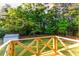 Lush backyard view from the deck, highlighting the home's connection with nature and outdoor living space at 4665 Jersey Walnut Grove Rd, Covington, GA 30014