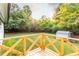 Elevated deck overlooking a green backyard, creating a perfect space for relaxation and outdoor enjoyment at 4665 Jersey Walnut Grove Rd, Covington, GA 30014