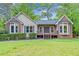 Charming ranch-style home with a well-maintained lawn and inviting front porch at 4805 Forest Way Ct, Marietta, GA 30066