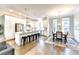 Open kitchen area with island seating and stainless steel appliances at 606 Broadview Ne Ter, Atlanta, GA 30324