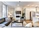 Open living space with stainless appliances and decorative fireplace at 606 Broadview Ne Ter, Atlanta, GA 30324
