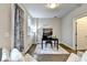 Modern home office with hardwood floors, desk, and decorative rug with natural light at 606 Broadview Ne Ter, Atlanta, GA 30324