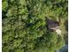 Aerial view of property showing a well-maintained home surrounded by lush greenery at 731 Sacketts Ct, Lawrenceville, GA 30043