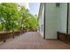 Expansive wooden deck with outdoor lighting, perfect for entertaining or relaxing, enhances the home's exterior at 731 Sacketts Ct, Lawrenceville, GA 30043