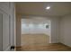 View of the basement featuring new laminate flooring and white paint at 731 Sacketts Ct, Lawrenceville, GA 30043