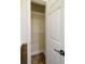 Linen closet featuring white wire shelving for organized storage at 731 Sacketts Ct, Lawrenceville, GA 30043