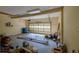 Spacious two-car garage needing clean up features overhead door and ample storage space at 731 Sacketts Ct, Lawrenceville, GA 30043
