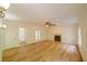 Inviting living room featuring hardwood floors, neutral paint, fireplace, and recessed lighting at 731 Sacketts Ct, Lawrenceville, GA 30043