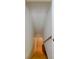 View of the stairway featuring wooden steps, white walls, and access to the lower level at 731 Sacketts Ct, Lawrenceville, GA 30043