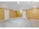 Large basement with carpet and two access doors at 992 Estes Sw Dr, Atlanta, GA 30310