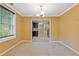 Bright dining area showcasing new carpet, modern lighting, and easy access to kitchen at 992 Estes Sw Dr, Atlanta, GA 30310