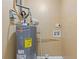 Water heater located in a small utility area at 992 Estes Sw Dr, Atlanta, GA 30310