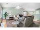 Comfortable living room area featuring a vaulted ceiling, neutral palette, and open floor plan at 1180 Chandler Ridge Dr, Lawrenceville, GA 30045