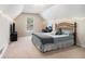 A bedroom features carpet, string lights, and a window that allows for ample natural light at 1180 Chandler Ridge Se Dr, Lawrenceville, GA 30045