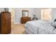 Bright main bedroom featuring two windows, and access to the ensuite bathroom and closet at 1180 Chandler Ridge Se Dr, Lawrenceville, GA 30045