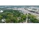 Aerial perspective of a modern home nestled amongst lush trees near train yard at 1676 Carroll Nw Dr, Atlanta, GA 30318