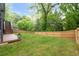 A spacious fenced backyard offers privacy and room for outdoor activities at 1676 Carroll Nw Dr, Atlanta, GA 30318