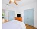 Bedroom with ceiling fan and ensuite at 1676 Carroll Nw Dr, Atlanta, GA 30318