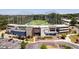 Topgolf community spot with landscaped areas, parking and a large outdoor golfing area at 1676 Carroll Nw Dr, Atlanta, GA 30318