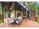 Outdoor deck features firepit and seating, great for relaxing at 1676 Carroll Nw Dr, Atlanta, GA 30318