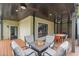 Cozy outdoor deck with fire pit and outdoor dining set at 1676 Carroll Nw Dr, Atlanta, GA 30318